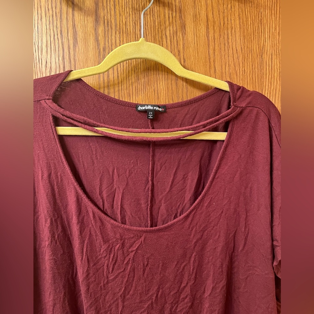 Charlotte Russe size 2x top with cute neck detail. 95% Rayon, 5% Spandex.